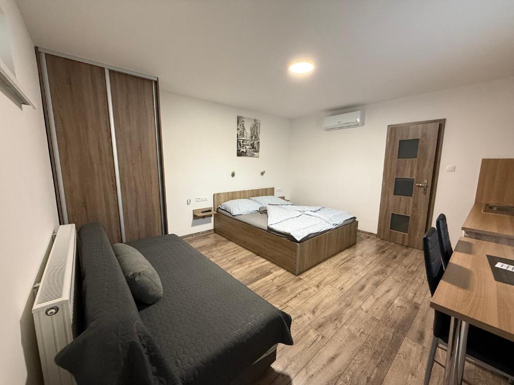Postel nebo postele na pokoji v ubytování Apartmán Tereza