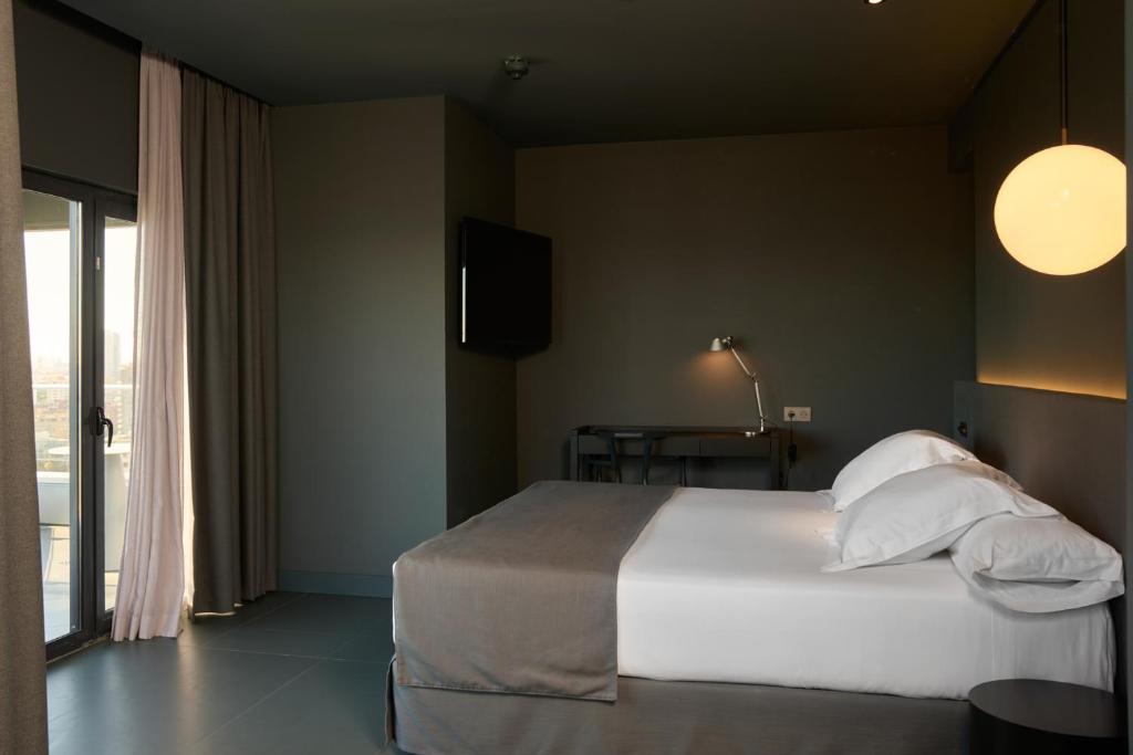 Letto o letti in una camera di Barcelona Princess