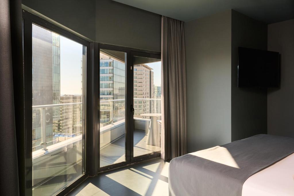 Letto o letti in una camera di Barcelona Princess