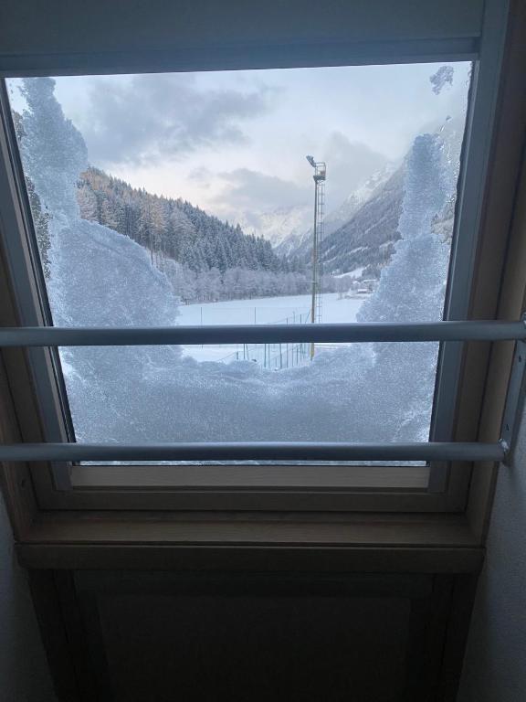 Nespecifikovaný výhled na hory nebo výhled na hory při pohledu z apartmánu