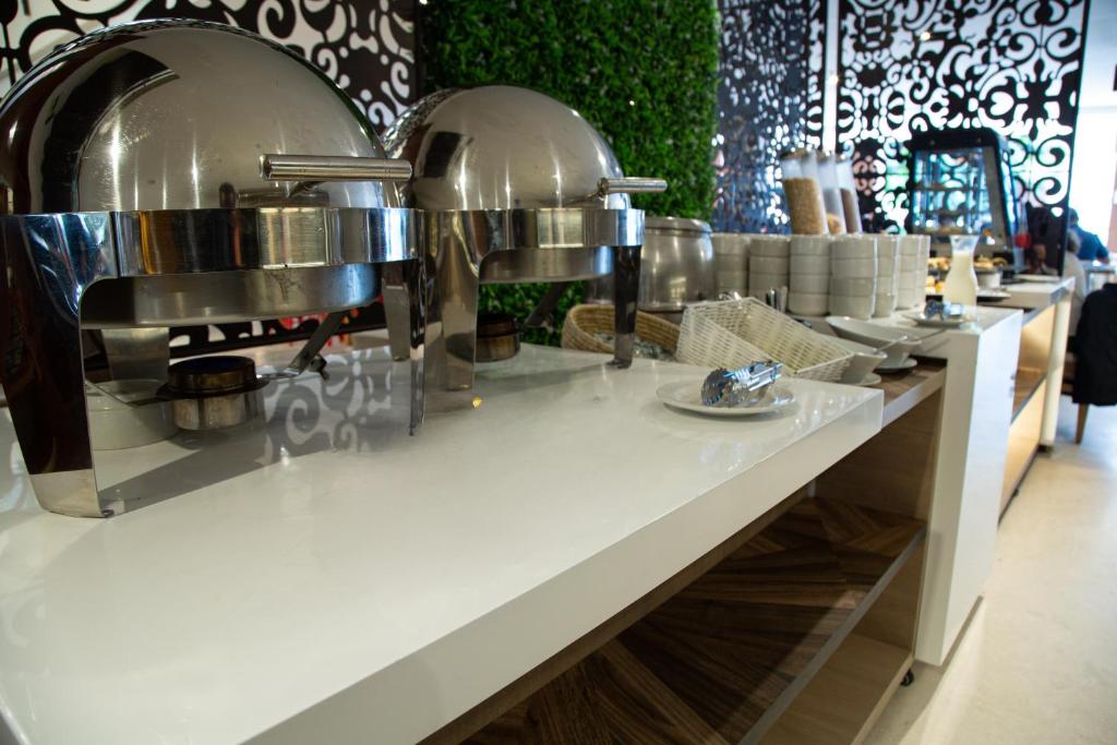 Kuchyň nebo kuchyňský kout v ubytování Hotel Grand Park