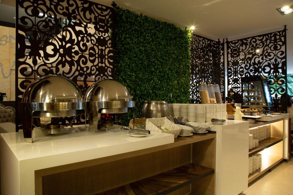 Kuchyň nebo kuchyňský kout v ubytování Hotel Grand Park