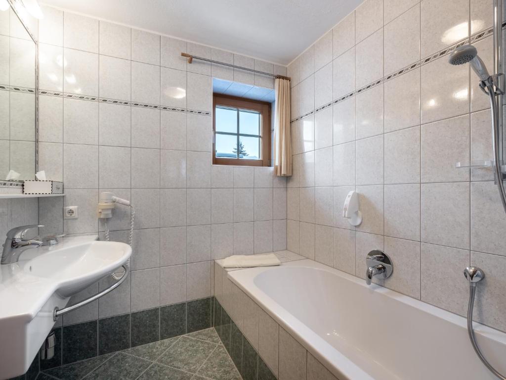 Koupelna v ubytování Hotel Garni Europa
