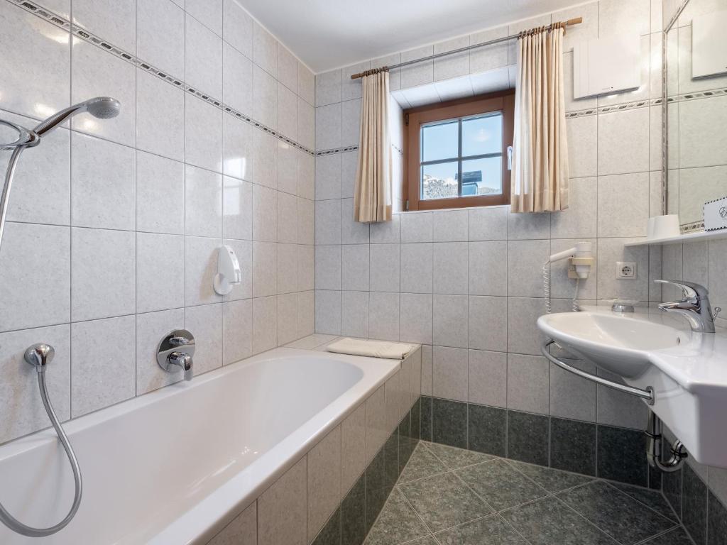 Koupelna v ubytování Hotel Garni Europa