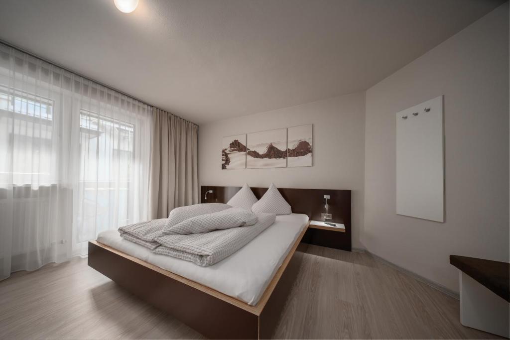 Posteľ alebo postele v izbe v ubytovaní Apart Benedikt