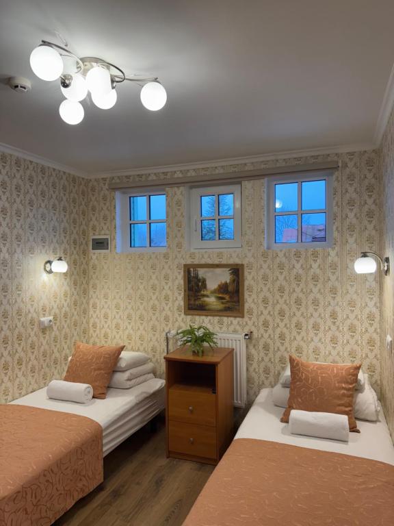 Postel nebo postele na pokoji v ubytování Green Villa