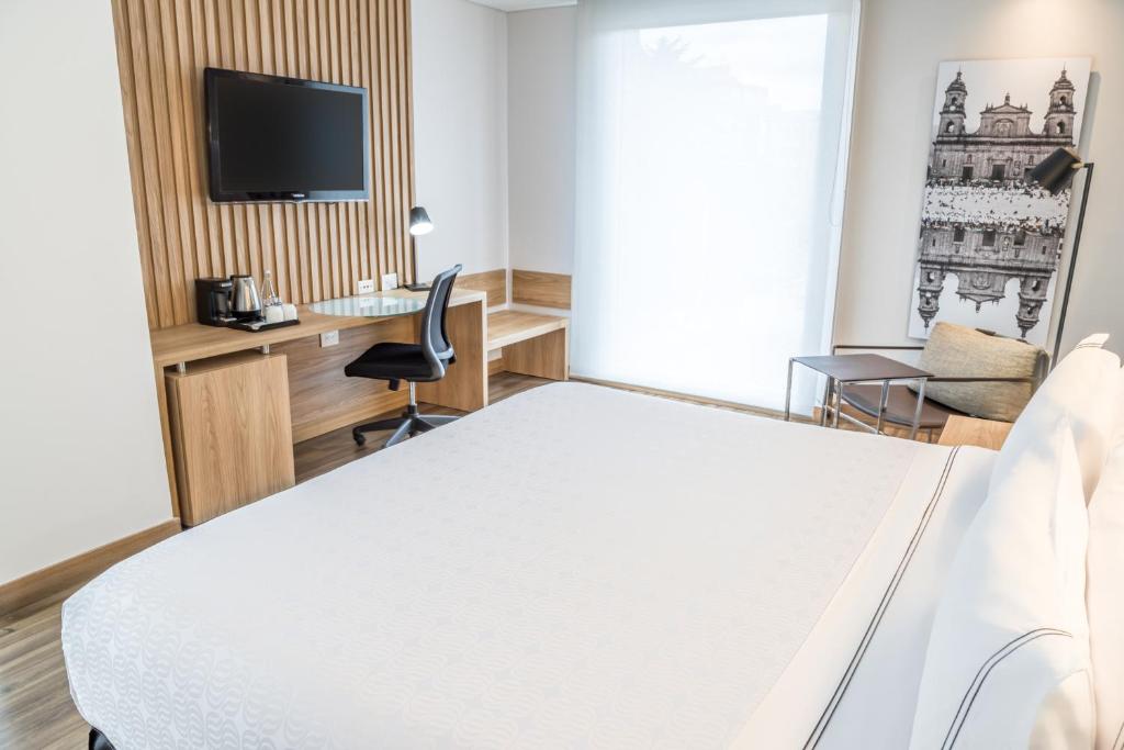 Un ou plusieurs lits dans un hébergement de l'établissement Sonesta Hotel Bogotá