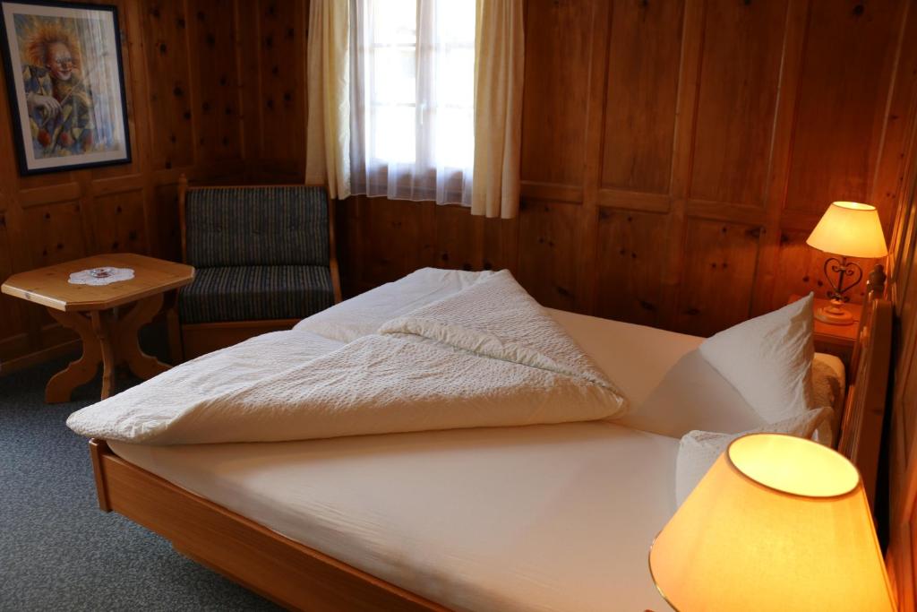 Postel nebo postele na pokoji v ubytování Hotel Restaurant Alpenblick