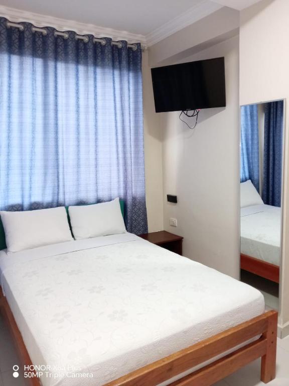 Postel nebo postele na pokoji v ubytování Hotel Andy