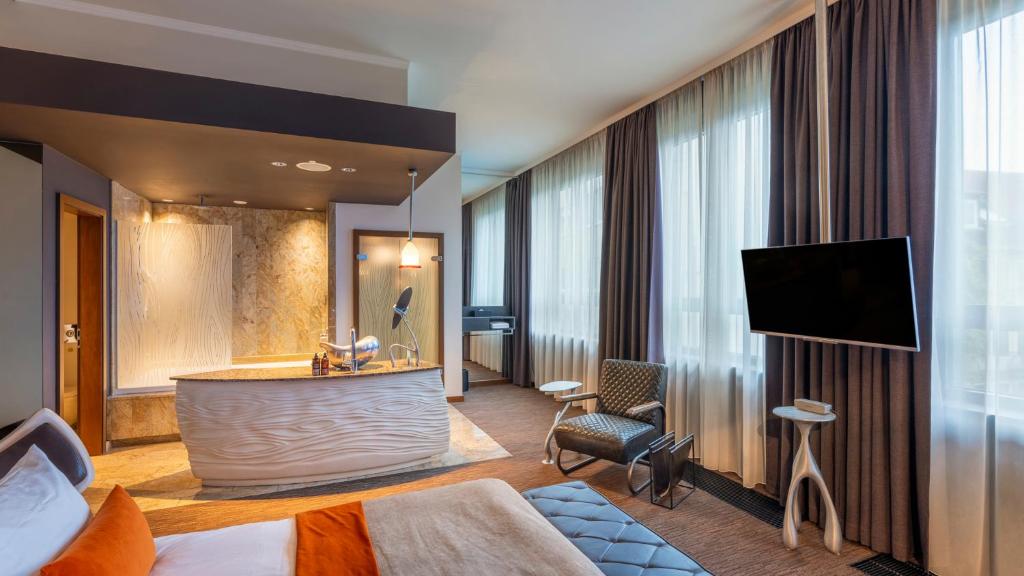 Postel nebo postele na pokoji v ubytování east Hotel Hamburg
