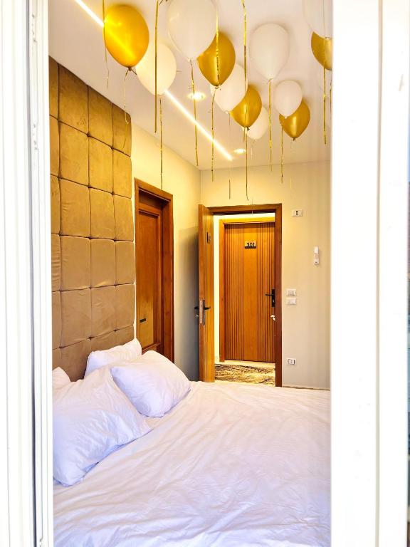 Postel nebo postele na pokoji v ubytování Oro Pyramids View Hotel