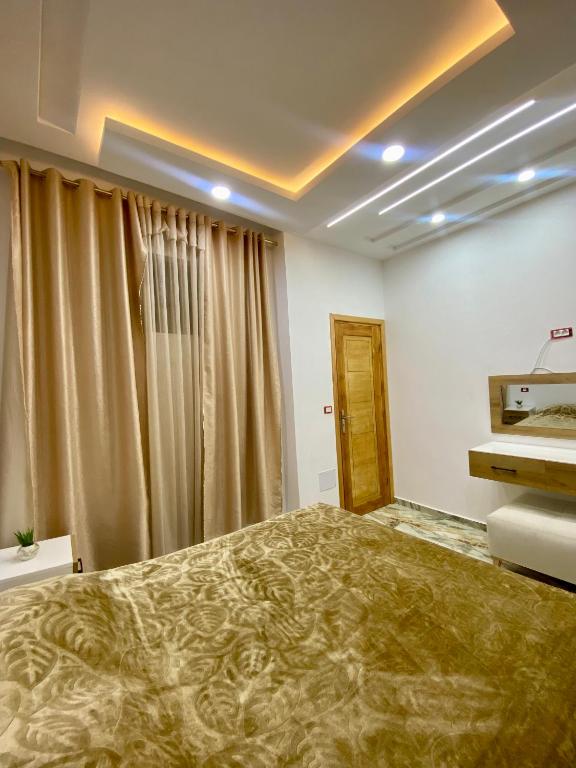 Postel nebo postele na pokoji v ubytování Appartement Les Vagues Bleues