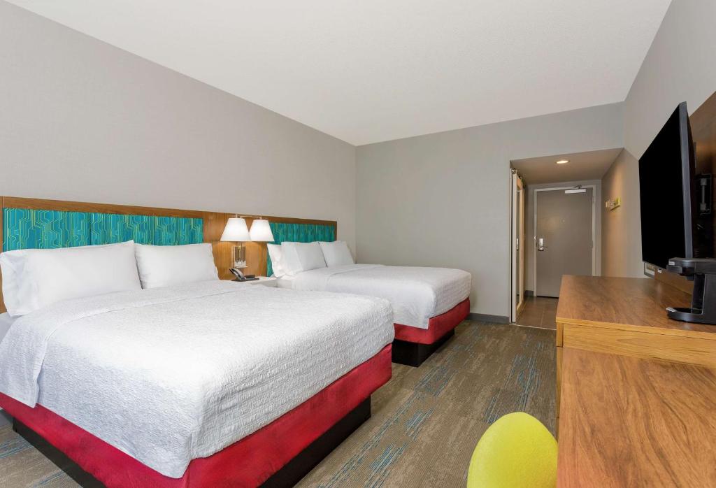 TV a/nebo společenská místnost v ubytování Hampton Inn By Hilton Ocoee Orlando