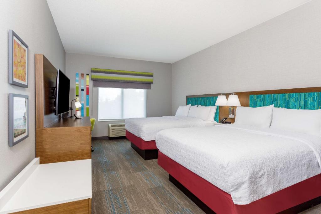 Postel nebo postele na pokoji v ubytování Hampton Inn By Hilton Ocoee Orlando
