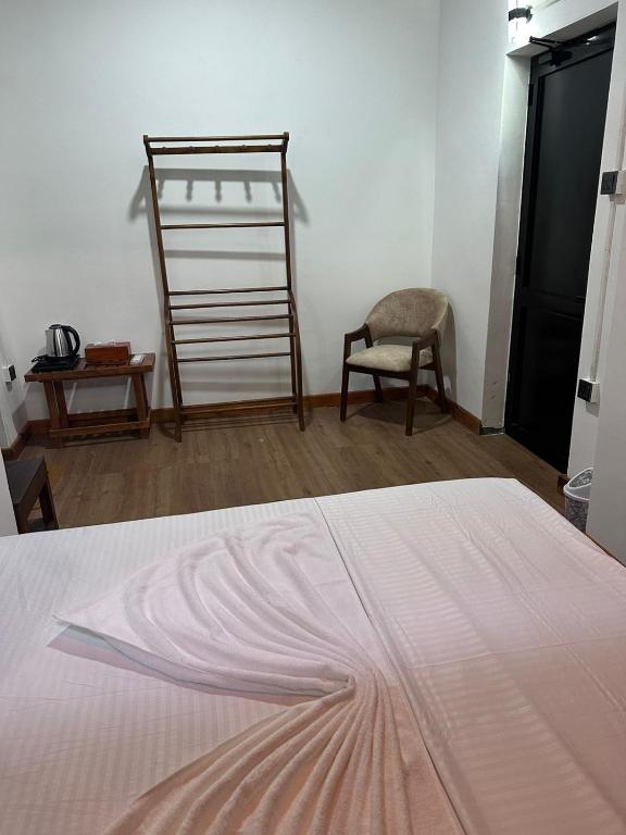 Postel nebo postele na pokoji v ubytování Singhagiri Haven Sigiriya