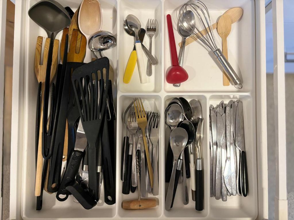 a drawer filled with utensils and spoons at Winjum Cabin Aurland Stegastein in Aurland