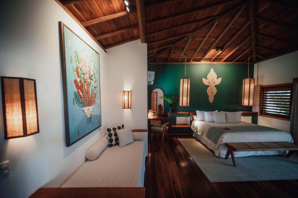 Postel nebo postele na pokoji v ubytování Vila Selvagem Hotel Contemporaneo