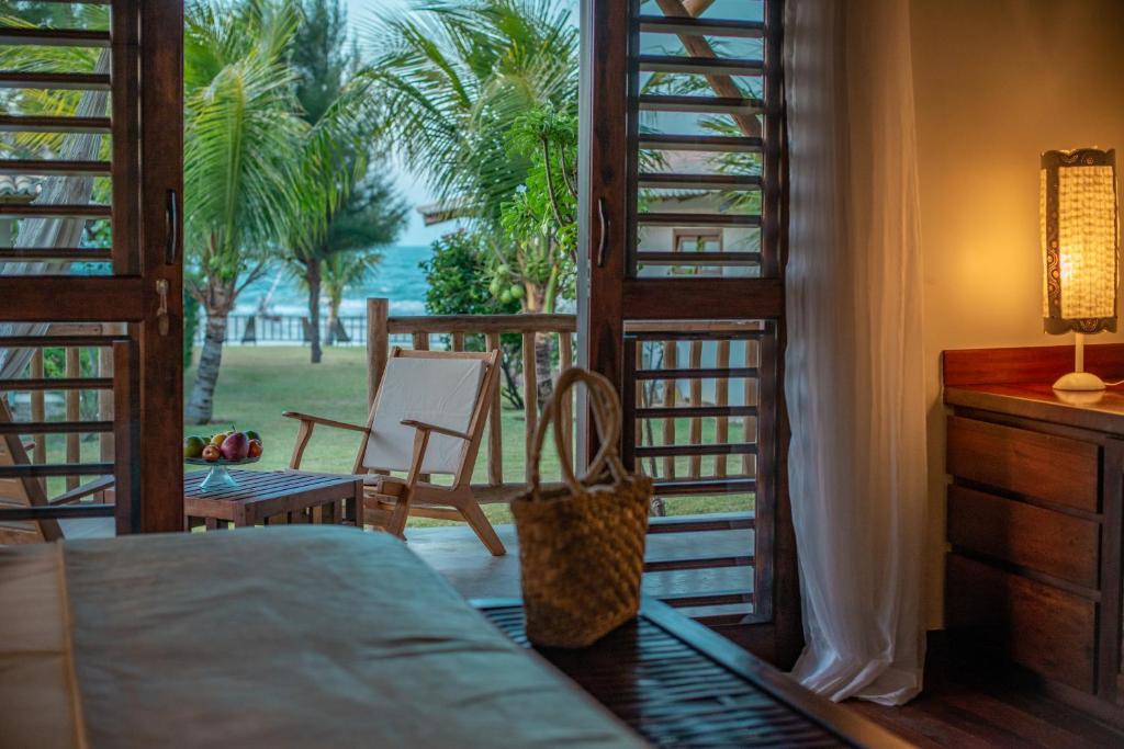Postel nebo postele na pokoji v ubytování Vila Selvagem Hotel Contemporaneo