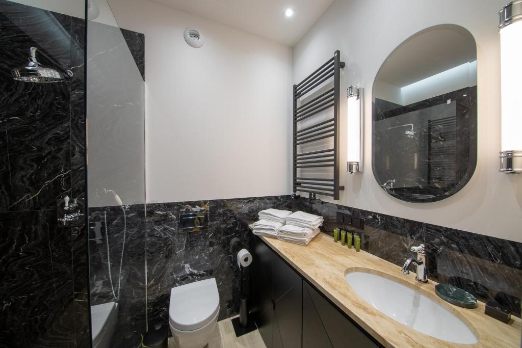 Koupelna v ubytování Boulevard Drobnera Residence - Apartamenty z widokiem na Odrę