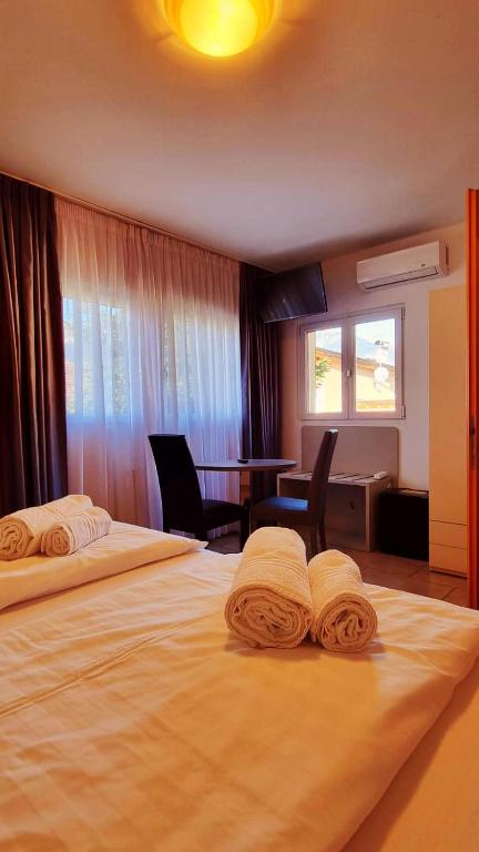 Postel nebo postele na pokoji v ubytování B&B Maya