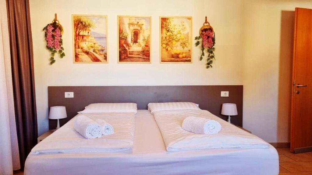 Postel nebo postele na pokoji v ubytování B&B Maya