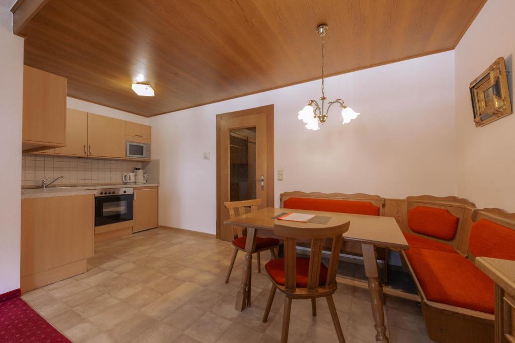 Kuchyň nebo kuchyňský kout v ubytování Appartement Christian