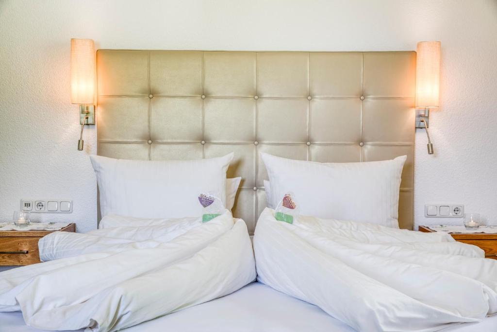 Voodi või voodid majutusasutuse Hotel Edelweiß-Schlössl toas