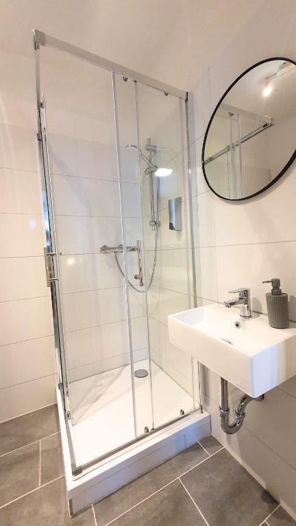 Koupelna v ubytování Good Stay Aparthotel mit kostenlosen Parkplätzen