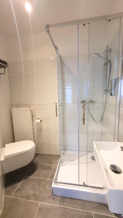 Koupelna v ubytování Good Stay Aparthotel mit kostenlosen Parkplätzen