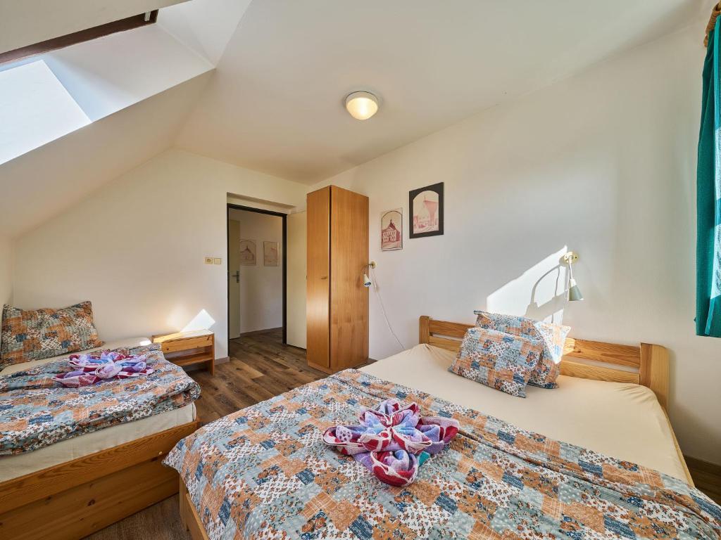 Postel nebo postele na pokoji v ubytování Holiday Home Stárkov by Interhome