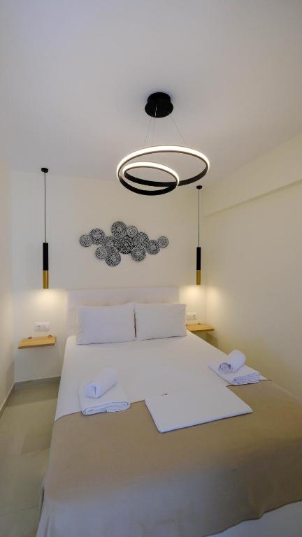 Postel nebo postele na pokoji v ubytování Cocoon Hotel-Beach bar