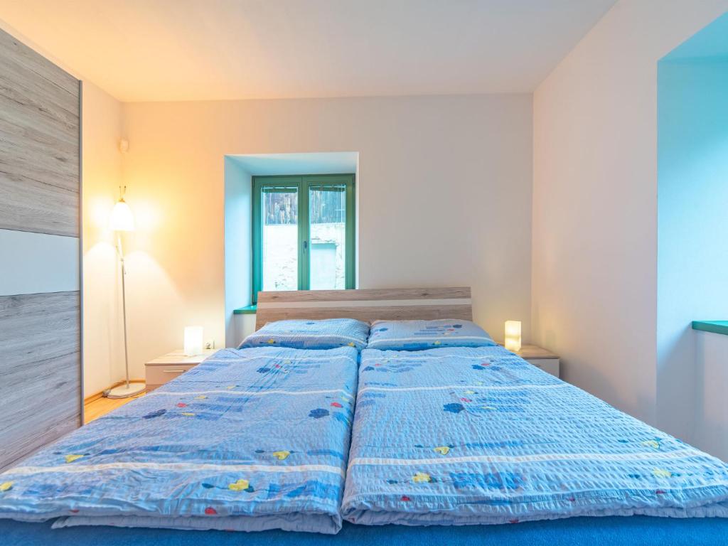 Postel nebo postele na pokoji v ubytování Holiday Home Klobasná by Interhome