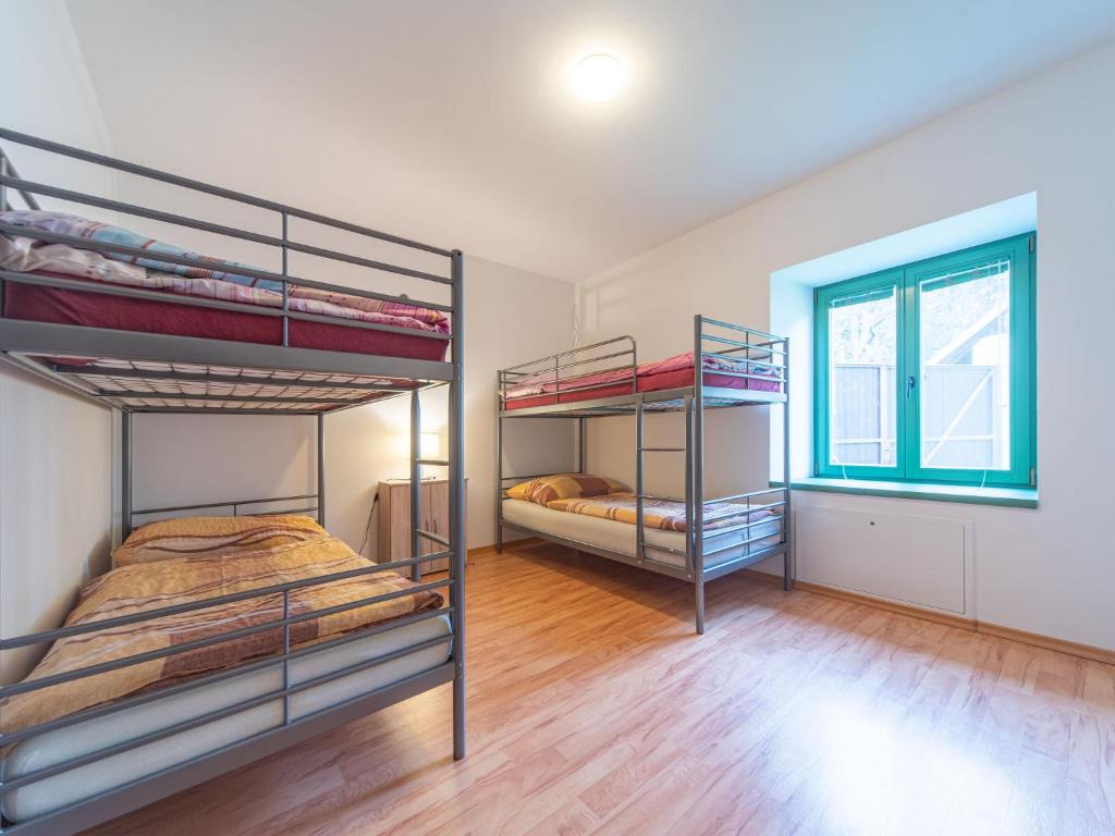 Postel nebo postele na pokoji v ubytování Holiday Home Klobasná by Interhome