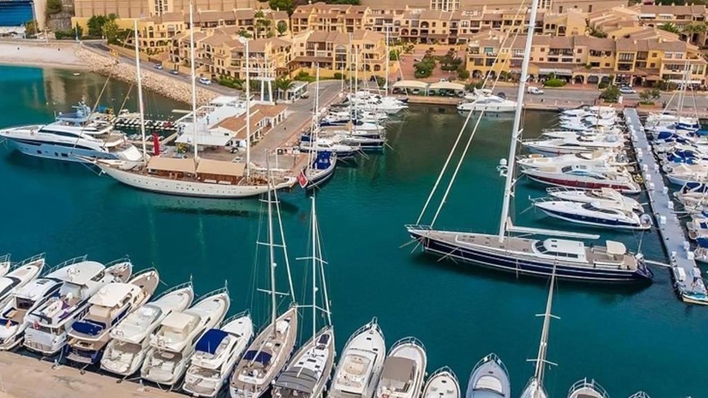 a bunch of boats docked in a harbor at I love Marina Greenwich, Altea in Altea