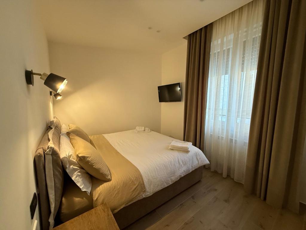 Postel nebo postele na pokoji v ubytování Bala Dream House