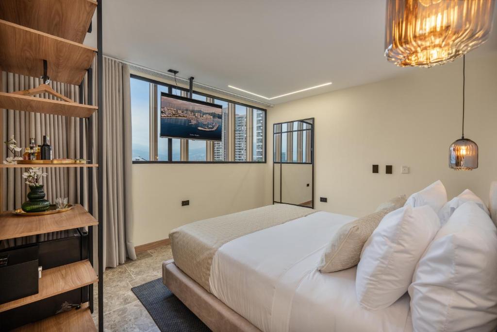 TV a/nebo společenská místnost v ubytování LIN Boutique Hotel by HOUSY HOST