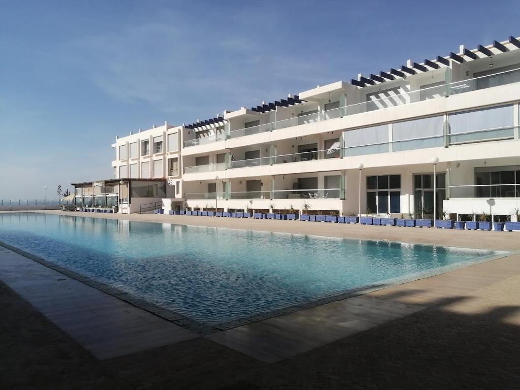 Bazén v ubytování Appartement Vue Piscine et Mer nebo v jeho okolí
