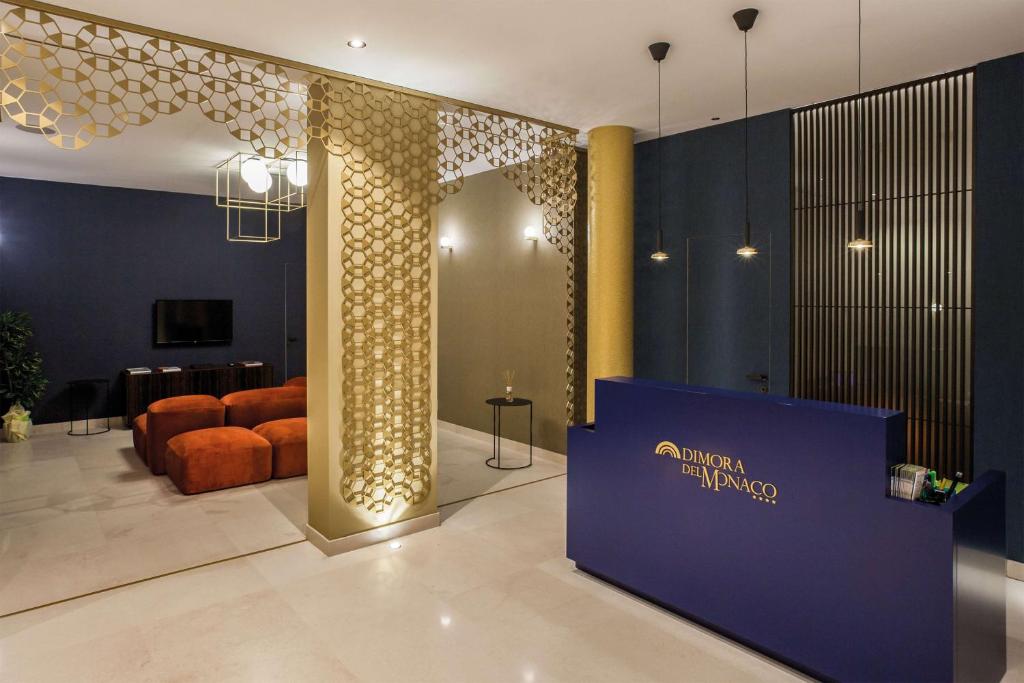 TV a/nebo společenská místnost v ubytování Best Western Plus Dimora del Monaco