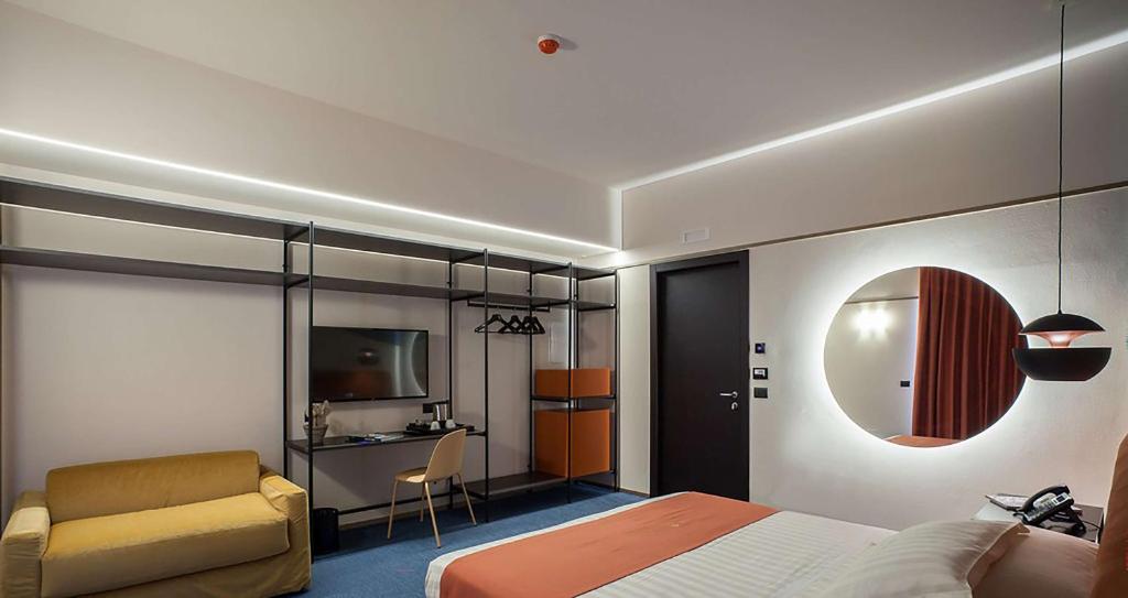 Postel nebo postele na pokoji v ubytování Best Western Plus Dimora del Monaco