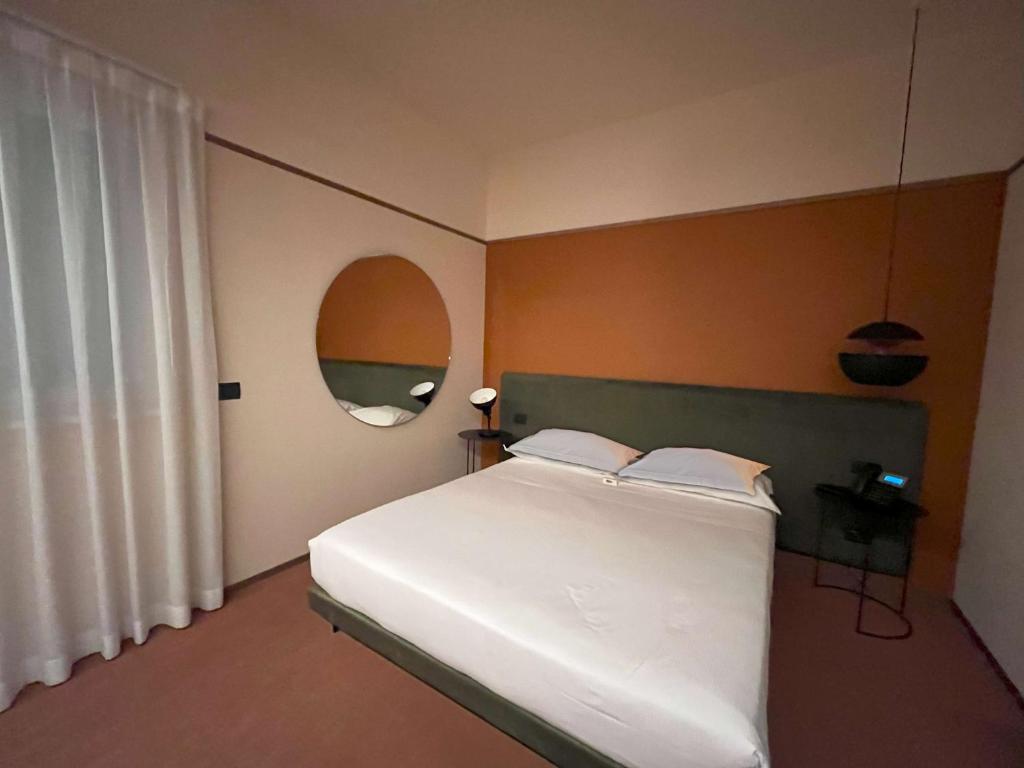 Postel nebo postele na pokoji v ubytování Best Western Plus Dimora del Monaco