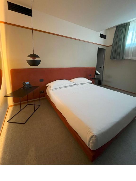 Postel nebo postele na pokoji v ubytování Best Western Plus Dimora del Monaco