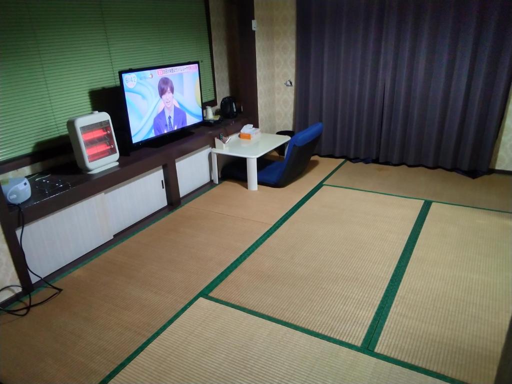 TV a/nebo společenská místnost v ubytování エフケーテックほったらかし宿