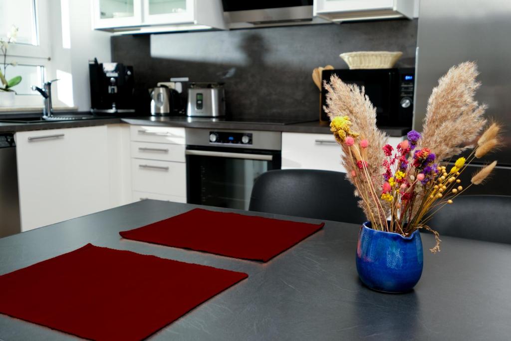 Kuchyň nebo kuchyňský kout v ubytování Apartment 4