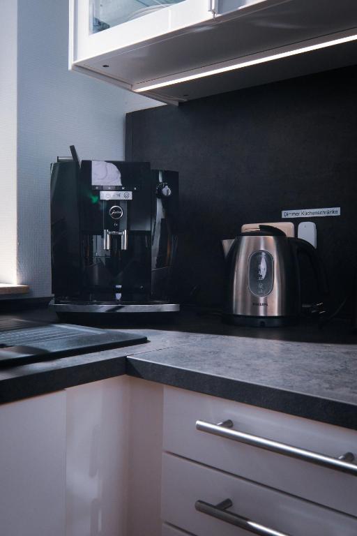 Kuchyň nebo kuchyňský kout v ubytování Apartment 4