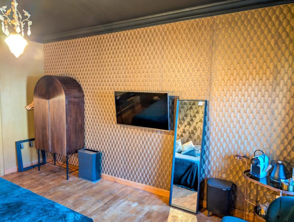 TV a/nebo společenská místnost v ubytování Porta Superia Boutique B&B