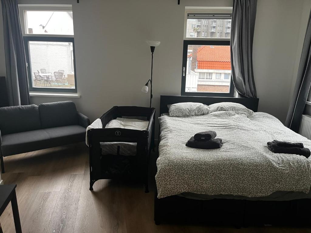 Letto o letti in una camera di Apartement hotel Stays by ADM