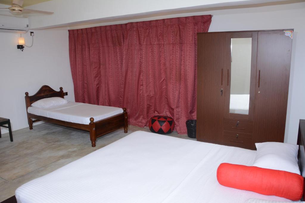 Postel nebo postele na pokoji v ubytování Hotel Tobiko