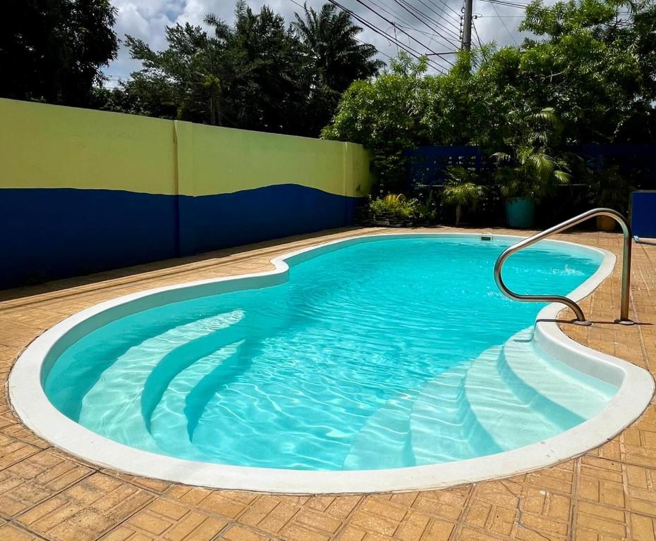 Bazén v ubytování Hotel Playa Bonita Tela nebo v jeho okolí