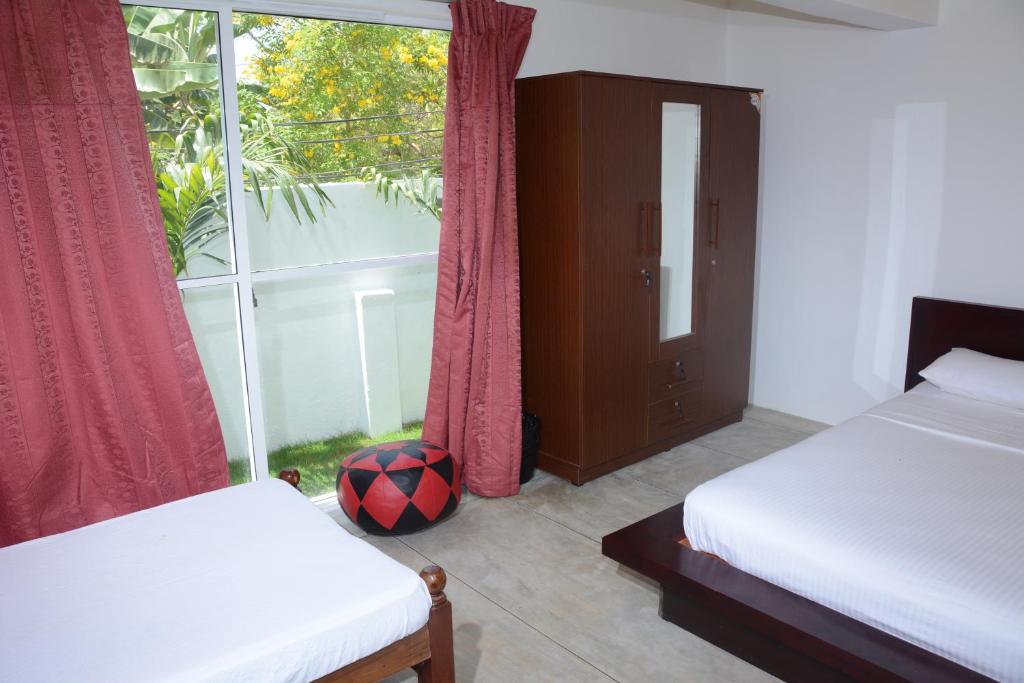 Postel nebo postele na pokoji v ubytování Hotel Tobiko