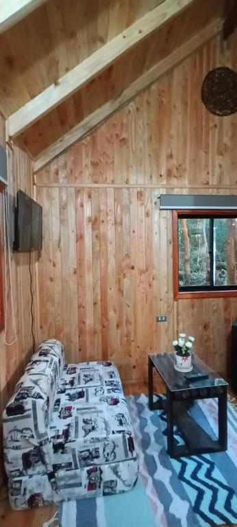 Postel nebo postele na pokoji v ubytování Cabaña Arrayan